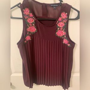 American Eagle crochet flowers maroon top
